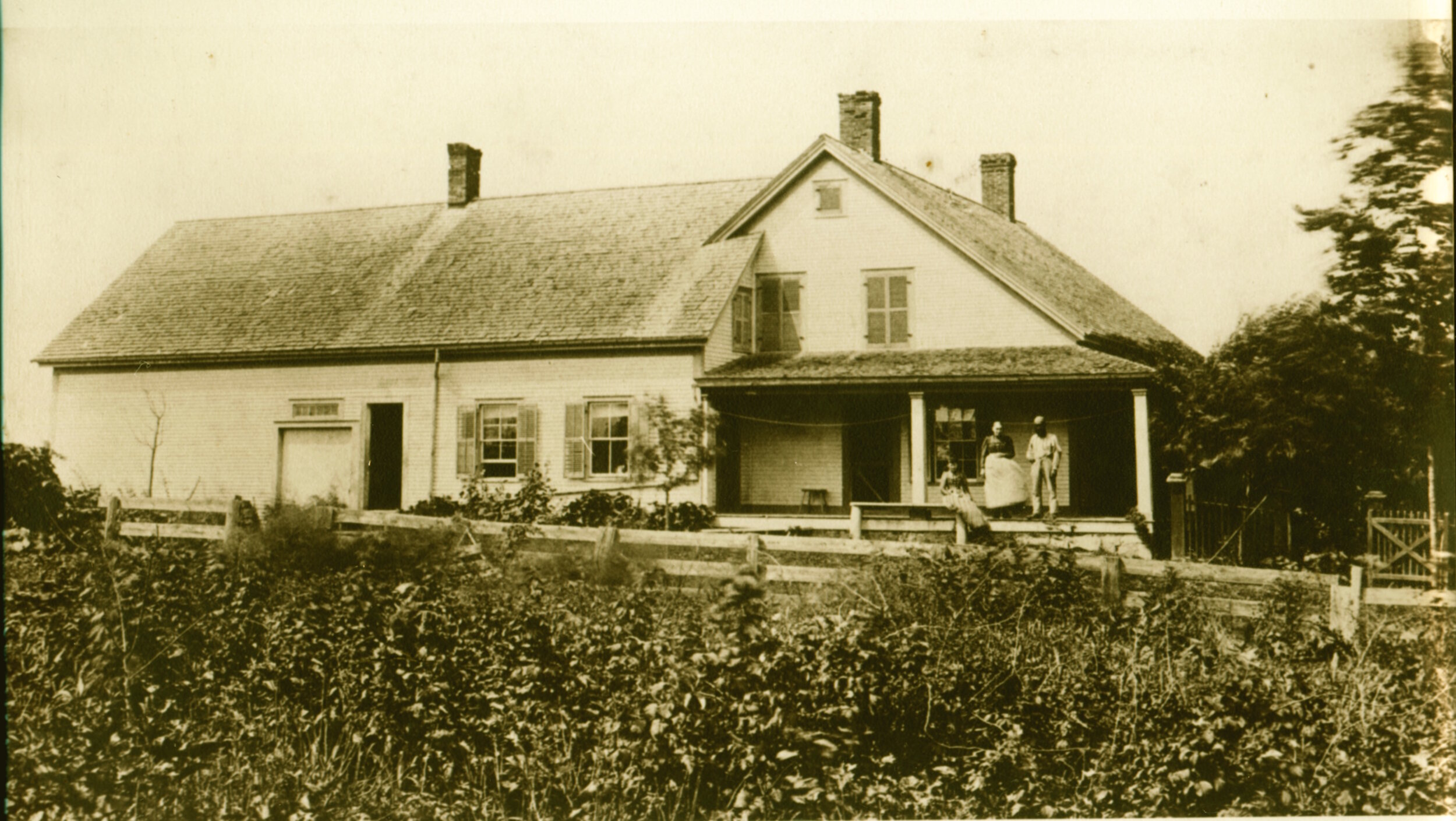 Historic House Couple on Porch 600dpi Color.jpeg